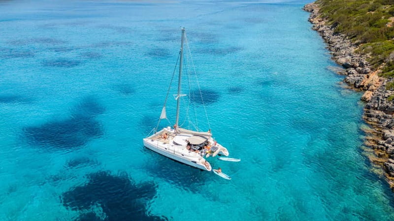 Agios Nikolaos: Spinalonga and Kolokytha Catamaran with Meal - Water Toys Included: Snorkeling, Fishing, and SUP