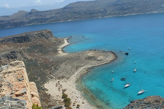 Balos Catamaran Private Sailing Cruise with Lunch - Lunch onboard: Cretan dakos, fruit, and Mediterranean comfort