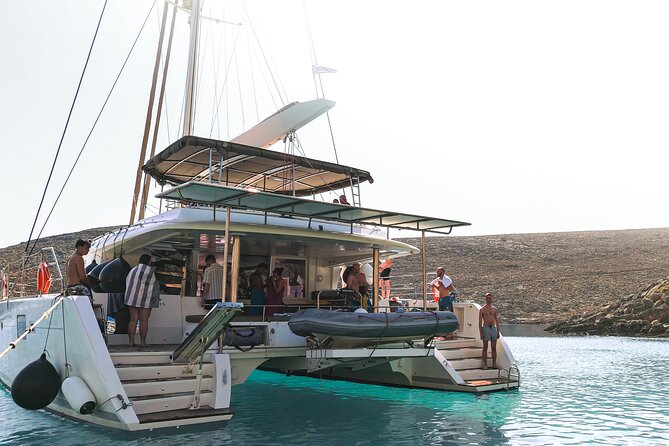Catamaran Cruise to Dia Island with Meal and Water Activities - Water Toys and Gear: SUP, Snorkeling, and Fishing Equipment