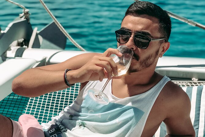 Chania: Afternoon Catamaran trip - Dinner, Drinks & Sunset - Kolymvari Port Start: Welcome That Sets the Tone