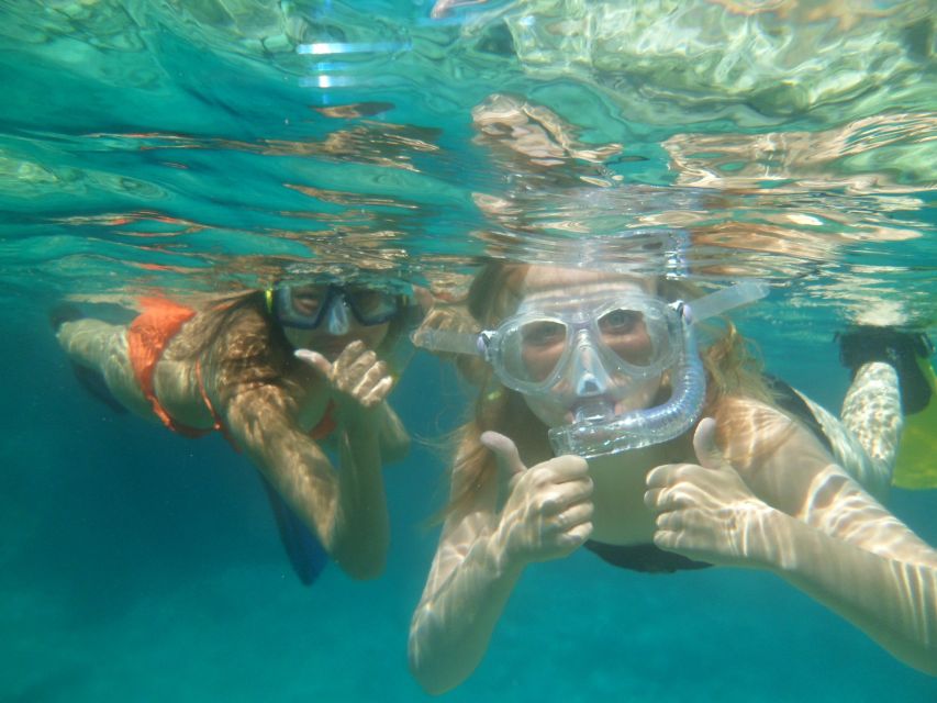 Chania: Boat Trip with Guided Snorkeling & Stand-Up Paddling - The photo and video souvenir is the hidden win