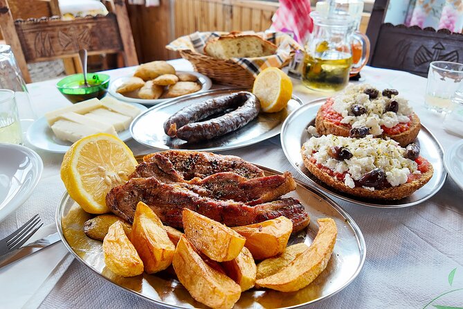 Chania: Evening Feasts A Journey through Cretan Flavors Food Tour - Venetian Harbor stop: lighthouse photos and an easy start
