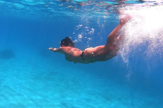 Chania: Morning Catamaran Cruise with Premium Lunch & Drinks - Agioi Theodoroi: the swim-and-snorkel anchor point that people remember