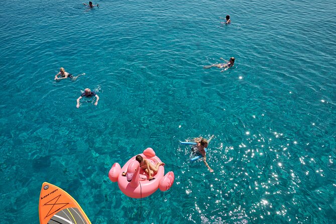 Chania Sunset Catamaran Cruise from Souda Port - Welcome on Board: Prosecco, Finger Foods, and Smooth Crew Energy