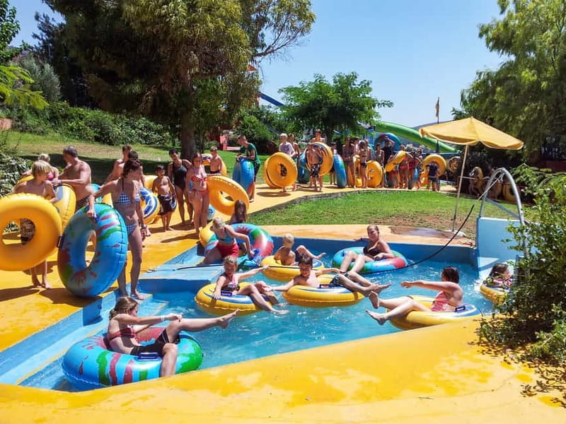 Crete: Acqua Plus Water Park Entrance with Transfer & Lunch - The park vibe, gardens, and where you can cool off without panic
