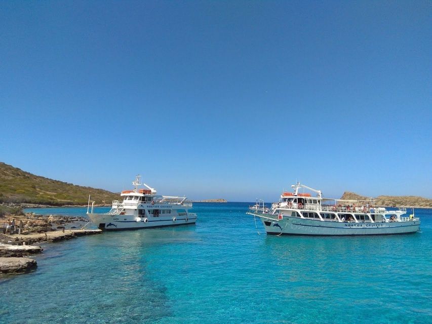 Crete: Mirabello Bay Cruise with Onboard Cocktail - Snorkeling Gear, Sun Protection, and What Helps on Deck