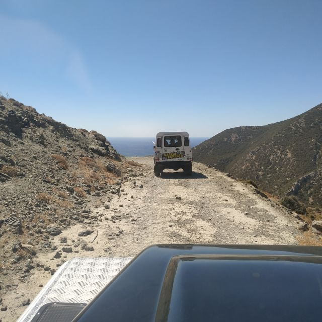 From Heraklion: Matala Beach - Caves & winery Full Day tour - Getting picked up and riding in an air-conditioned 4x4