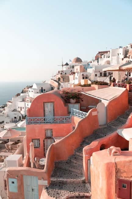 From Heraklion: Santorini Day Tour with Optional Transfer - Fira: capital-city energy, caldera views, and shop time