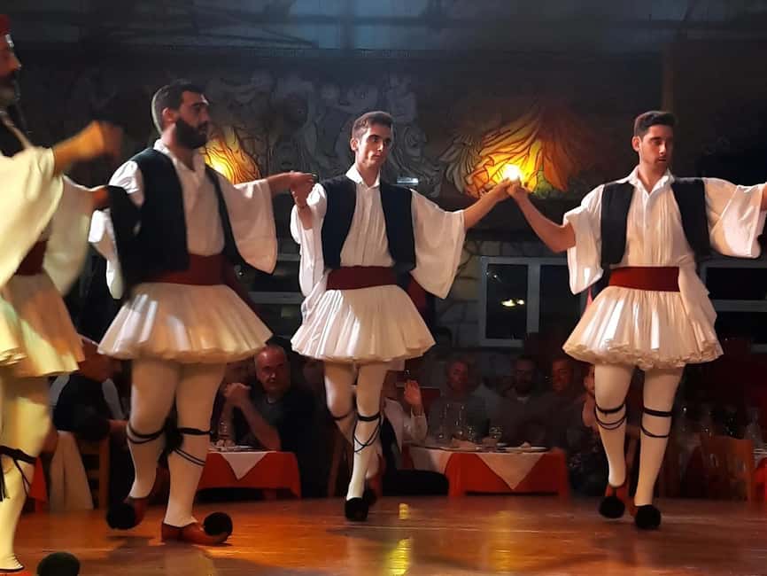 Heraklion: Cretan Folklore Night with Dinner & Transfers - The Anopolis welcome: raki, locals, and that first shift in mood