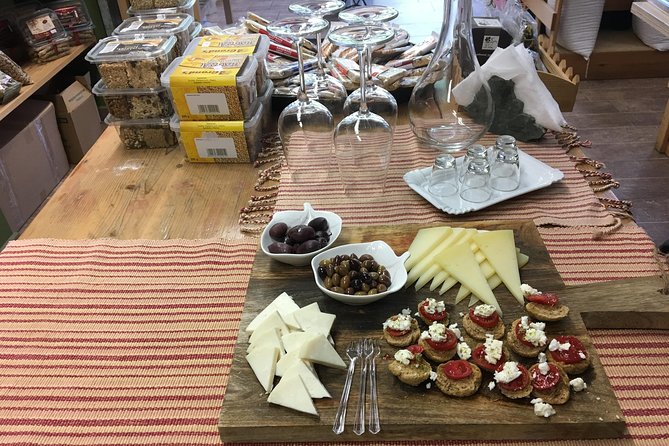 Heraklion Cultural Tasting Walking Tour - Cretan Delicacies - Stop 3: Olive Oil, Table Olives, Cheese, and Raki Hospitality