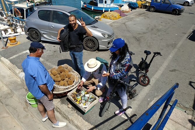 Heraklion Ecobike Tour & Cretan Wine Tasting Experience - Old Venetian Harbor views, then you roll into shopping streets