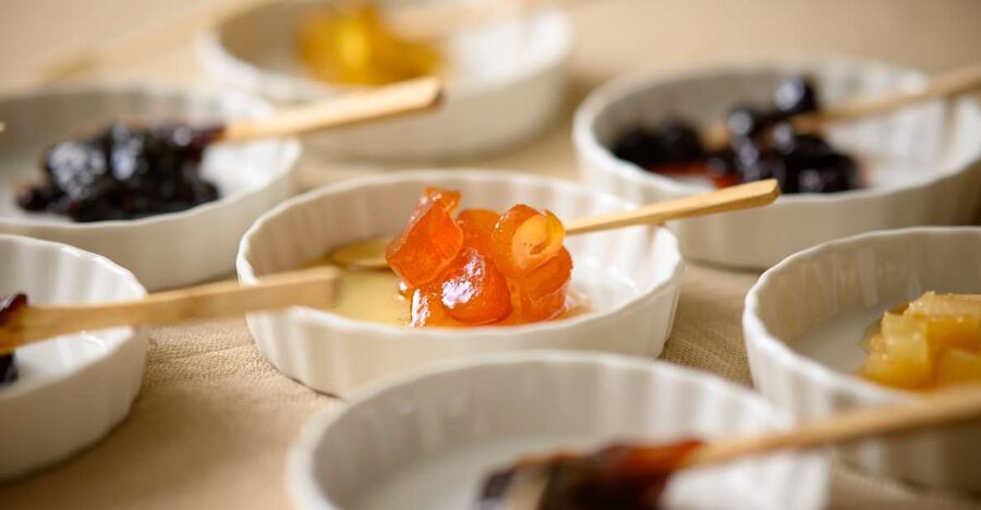 Heraklion: Private Beekeeping Experience with Honey Tasting - The tasting spread: honey, sweet spoon, marmalade, rakomelo, and olive oil