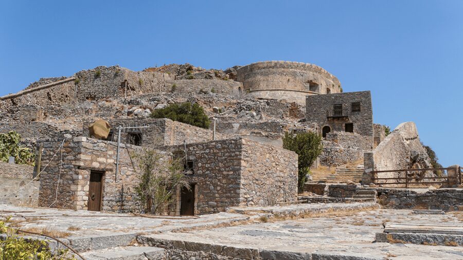 Heraklion: Spinalonga and Agios Nikolaos Cruise with Lunch - Transportation reality: air-conditioned bus, but timing depends on pickup points