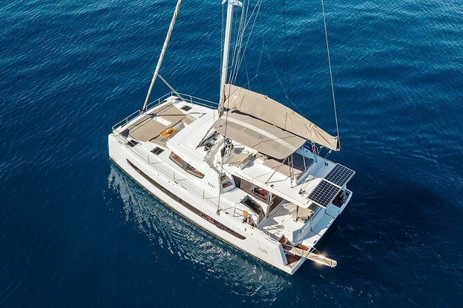 Hersonissos: Luxury Sunset Catamaran Cruise Sushi & Open Bar - Saint George Bay: the swim and snorkeling stop you will plan your photos around