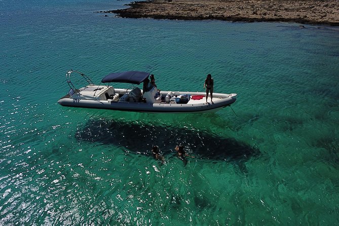 Private Boat Trip Chania - Balos (price is per group-up to 9 people) - Menies beach snorkeling: calm water and a more playful side