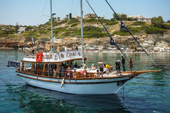 Sailing Trips with Cretan Sailing - BBQ lunch on a boat: grilled choices, salad, bread, and fruit