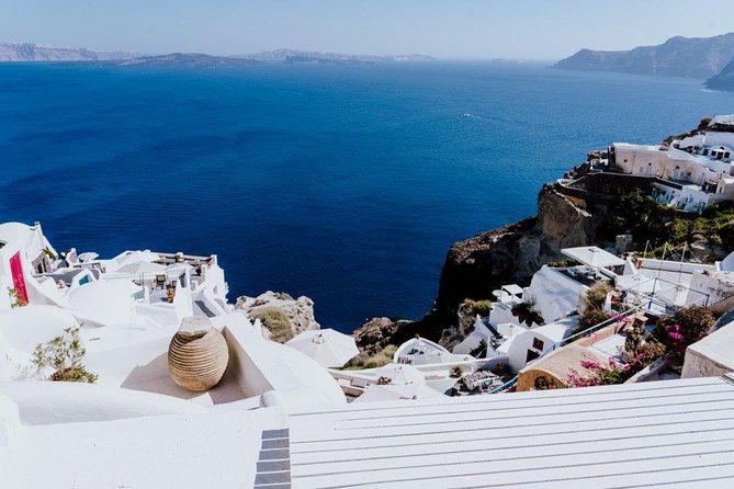 Santorini Island: Guided Tour From Heraklion Crete - Fira and the Three Bells of Fira: where the views open up