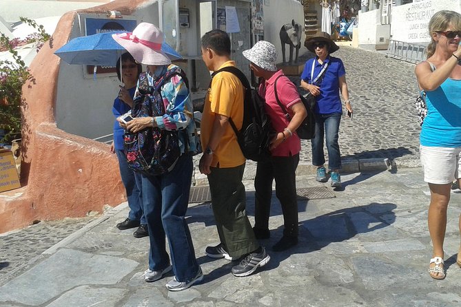Santorini - The pearl of the Aegean - Oia: narrow streets, stone lanes, and that sea-sun feeling