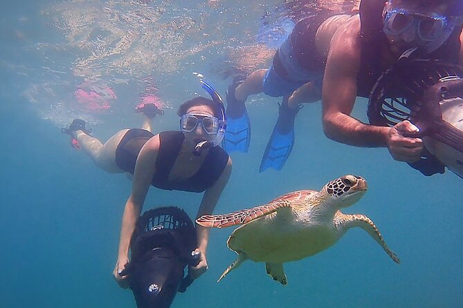 Snorkeling Tour with Sea Scooter in Heraklion - The guide dynamic: what Yannis and Johanna are like on the water